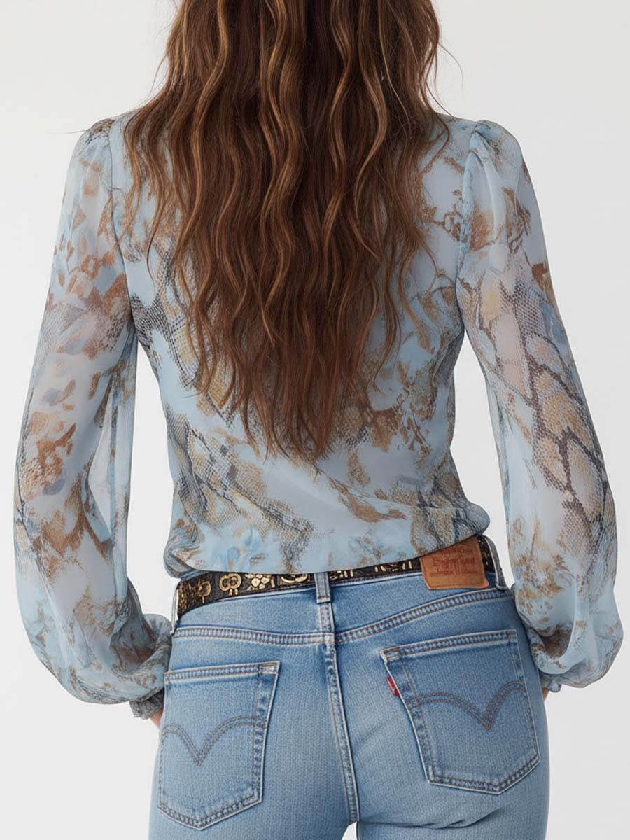 Adelia | Blusa in chiffon con volant e cerniera frontale con stampa blu ghiaccio